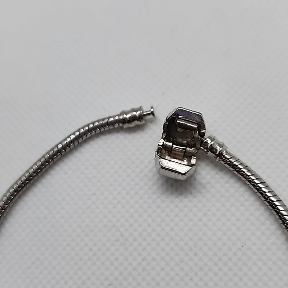 Silver Tone Multi Charm Bracelet - Picture 5 of 7